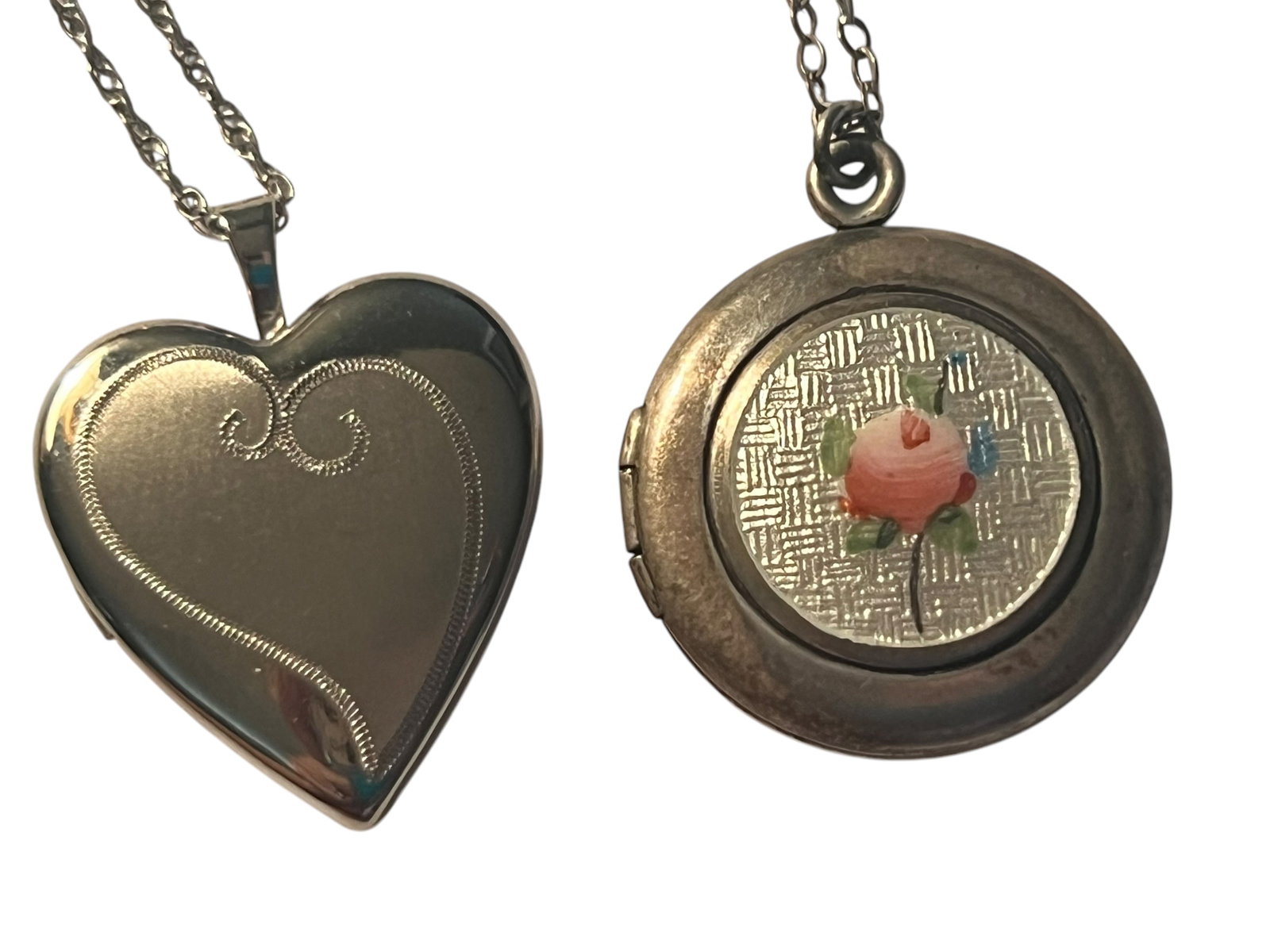 Lot of 2 Vintage Sterling Silver Lockets 1 Heart and I Enamel Both on Chains: Lot of 2 Vintage Sterling Silver Lockets 1 Heart and I Enamel Both on Chains. Chain on heart locket is 18 inches and the enamel locket is on a 16 inch chain.