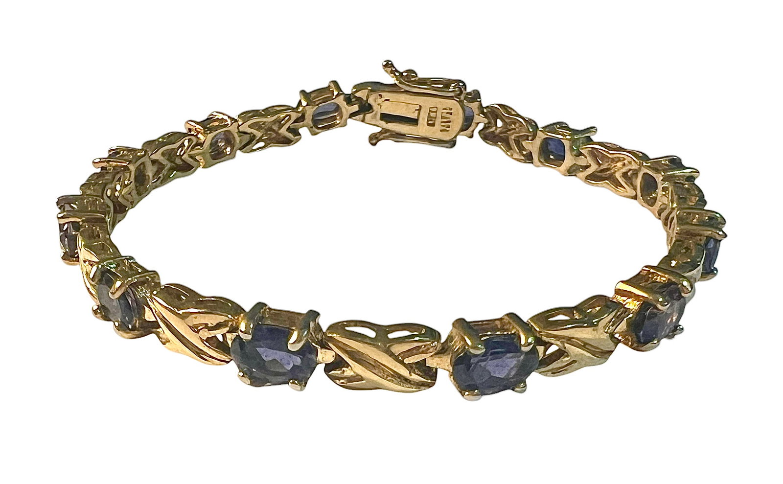 Sterling Silver with Gold Plate Tennis Bracelet with Amethyst: Sterling Silver with Gold Plate Tennis Bracelet with Amethyst. It is 7 inches long.
