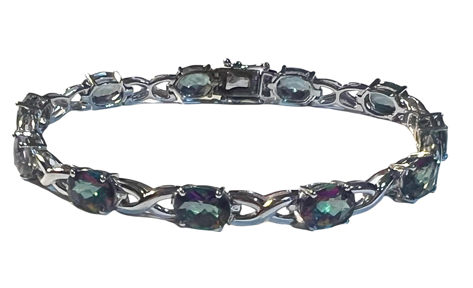 Sterling Silver Mystic Fire Topaz Bracelet: Sterling Silver Mystic Fire Topaz Bracelet. It is7.5 inches long.