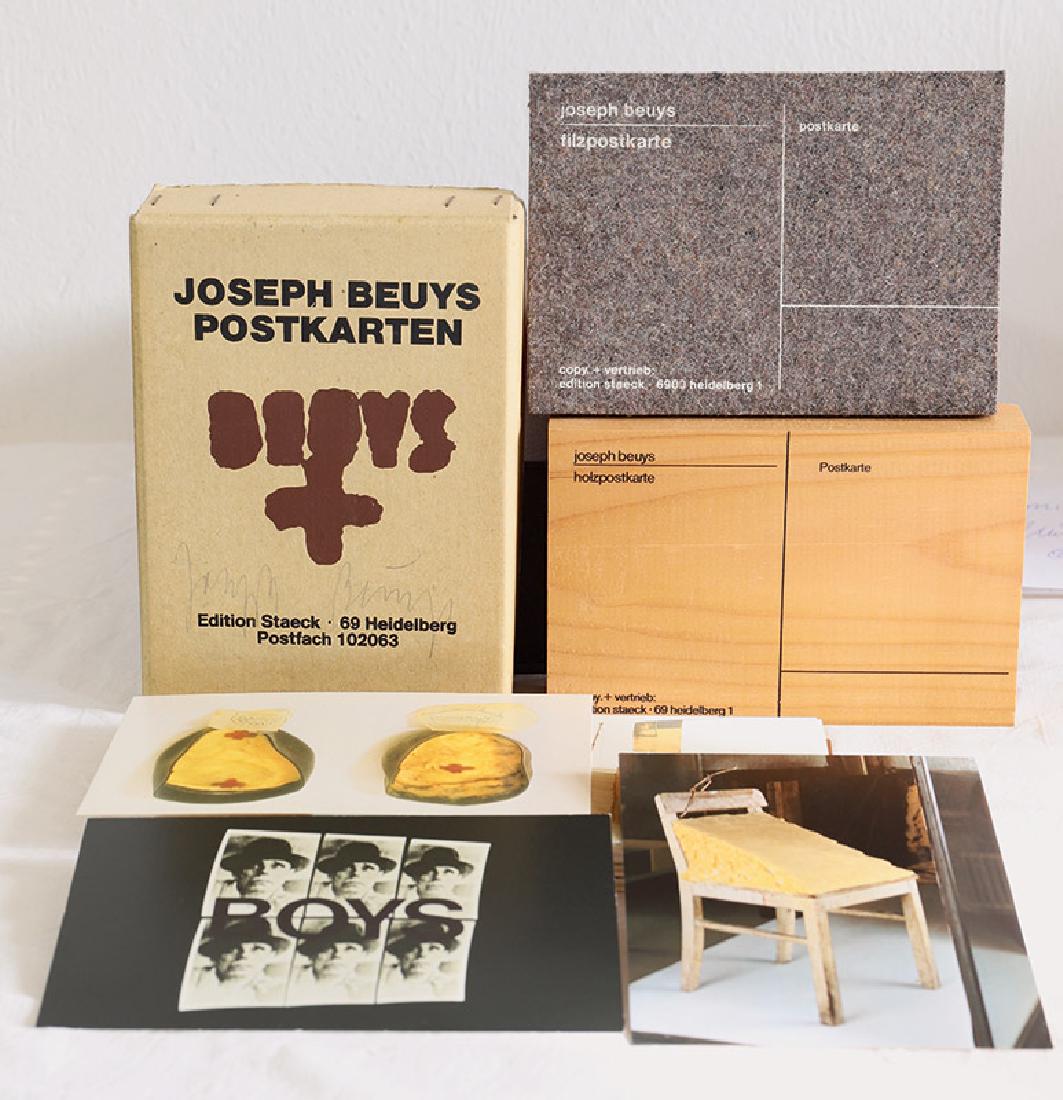 Joseph Beuys* (1921-1986): Joseph Beuys Postcards, Edition Staeck, 82 Postcards in original box, 16.5 x 12 x 3.5 cm, box signed. 1 felt postcard, Edition Staeck, 10,7 x 15 cm. 1 wooden postcard, Edition Staeck, 10 x 15 x 3.5 cm