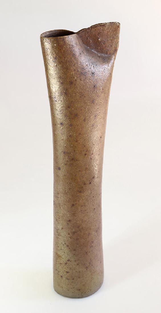 Joanna Constantinidis, High Vase: Ceramics. Brown surface with dark brown dots. Mouth asymmetrically formed. H. 48.5 cm. Above the stand: workshop mark c in circle (stamp), 1970s/1980s, Literature: Keramik aus Kösters Kunstkammer. Ka