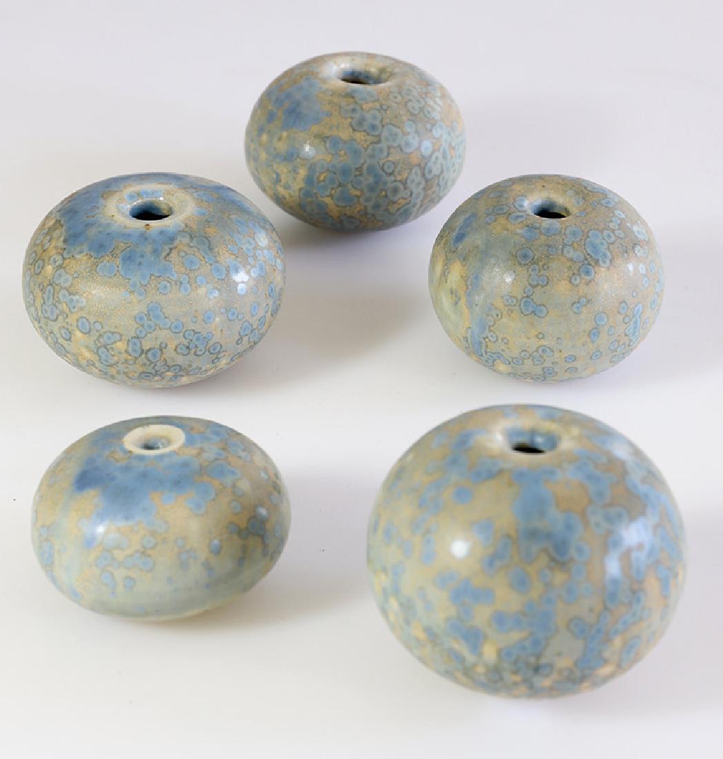 Gotlind Weigel, 5 small vases: Ceramics. Fine stoneware. Light blue crystal glaze on beige ground. H. 3.5 - 5 cm. Three vases on the bottom marked with workshop mark (stamp), two vases designated and dated: Weigel 70 (carved)., 197