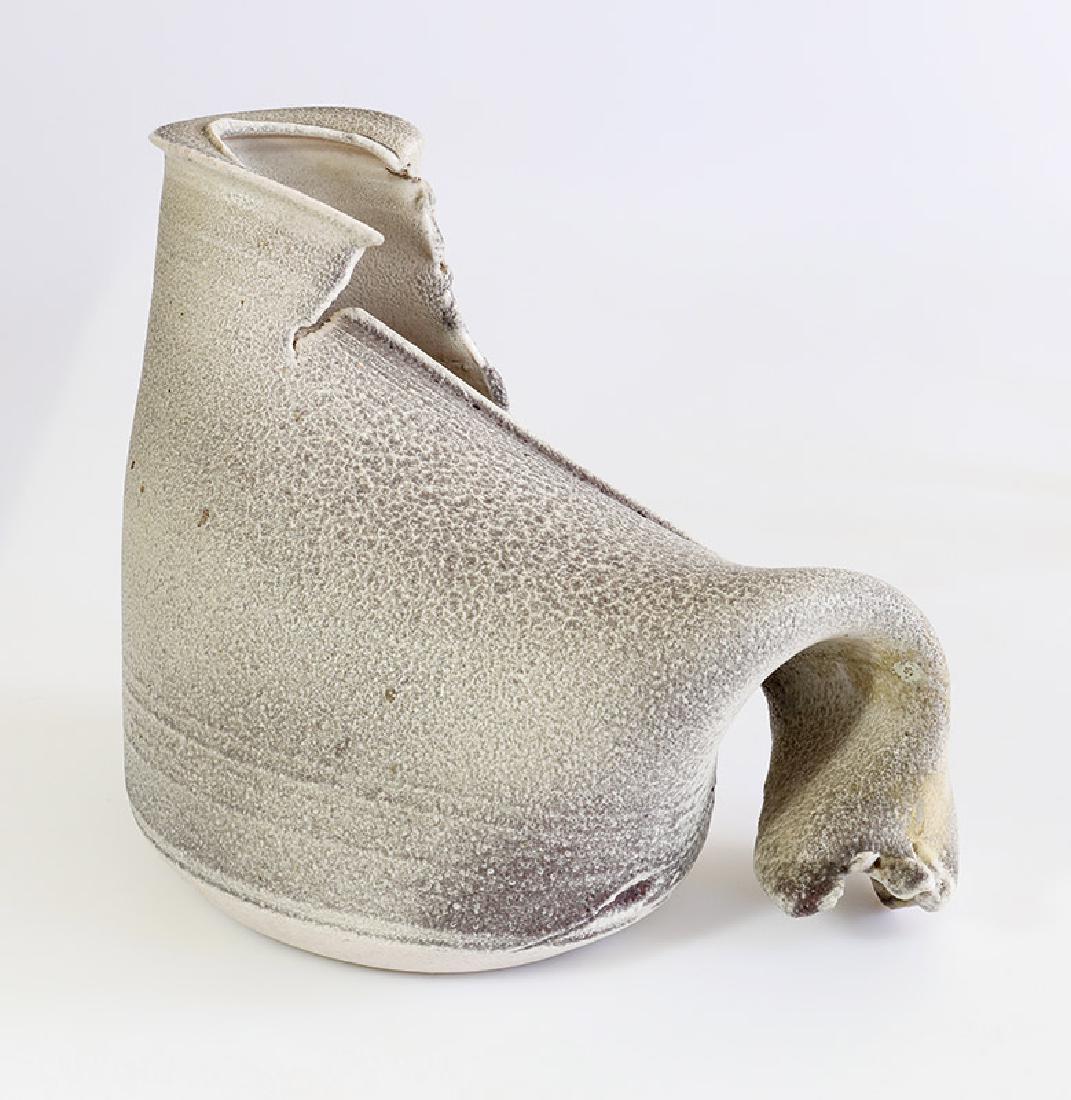 Carlo Zauli, Vaso strappato: Ceramics. Stoneware. Turned, torn and pressed. Light gray, dark-vaulted glaze on a light background, partially reddish in the hollows. 27 x 32 x 22 cm. Marked on the bottom: ZAULI (engraved). Restored