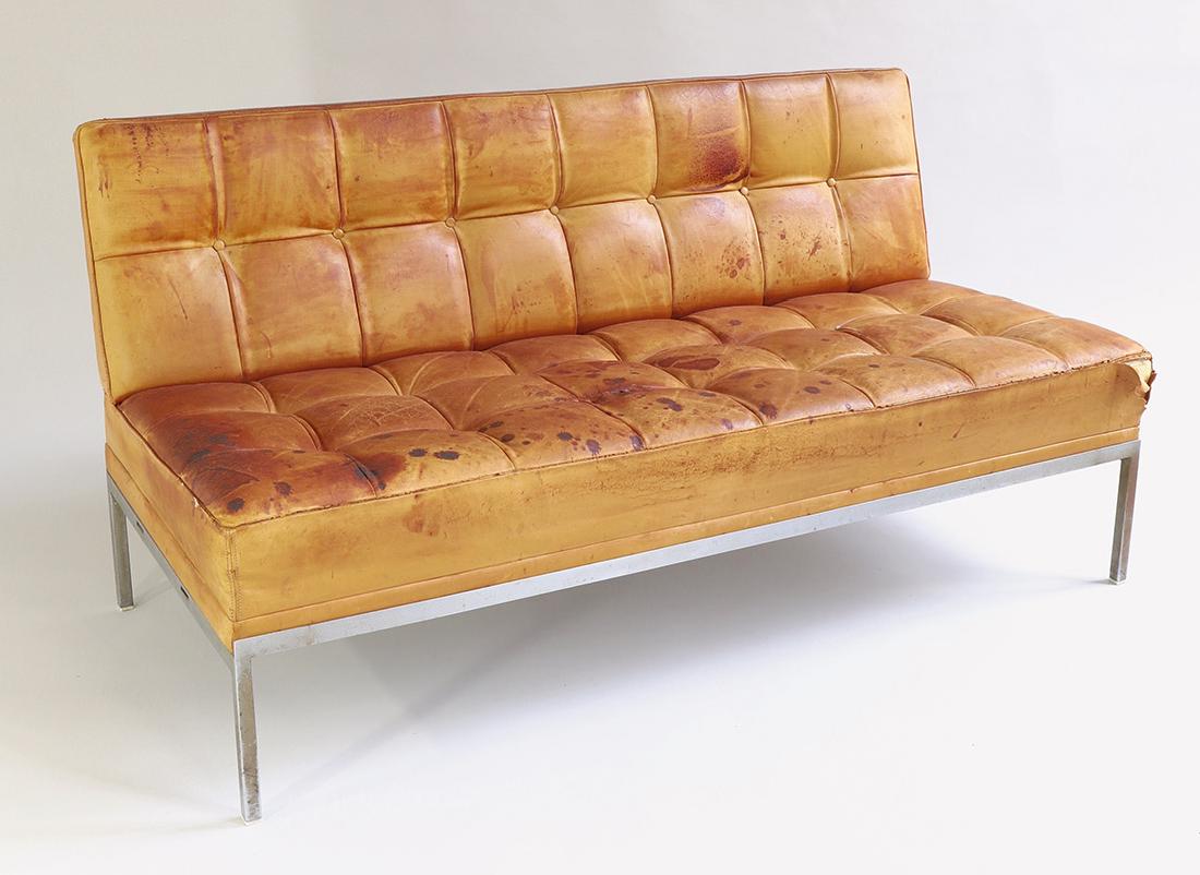 Sofa Constanze, Johannes Spalt, Wittmann: Frame made of square bars, chromed metal, upholstered seat and back with brown leather cover, cover with cracks and stains. 72 x 139 x 64 cm., Design 1961.