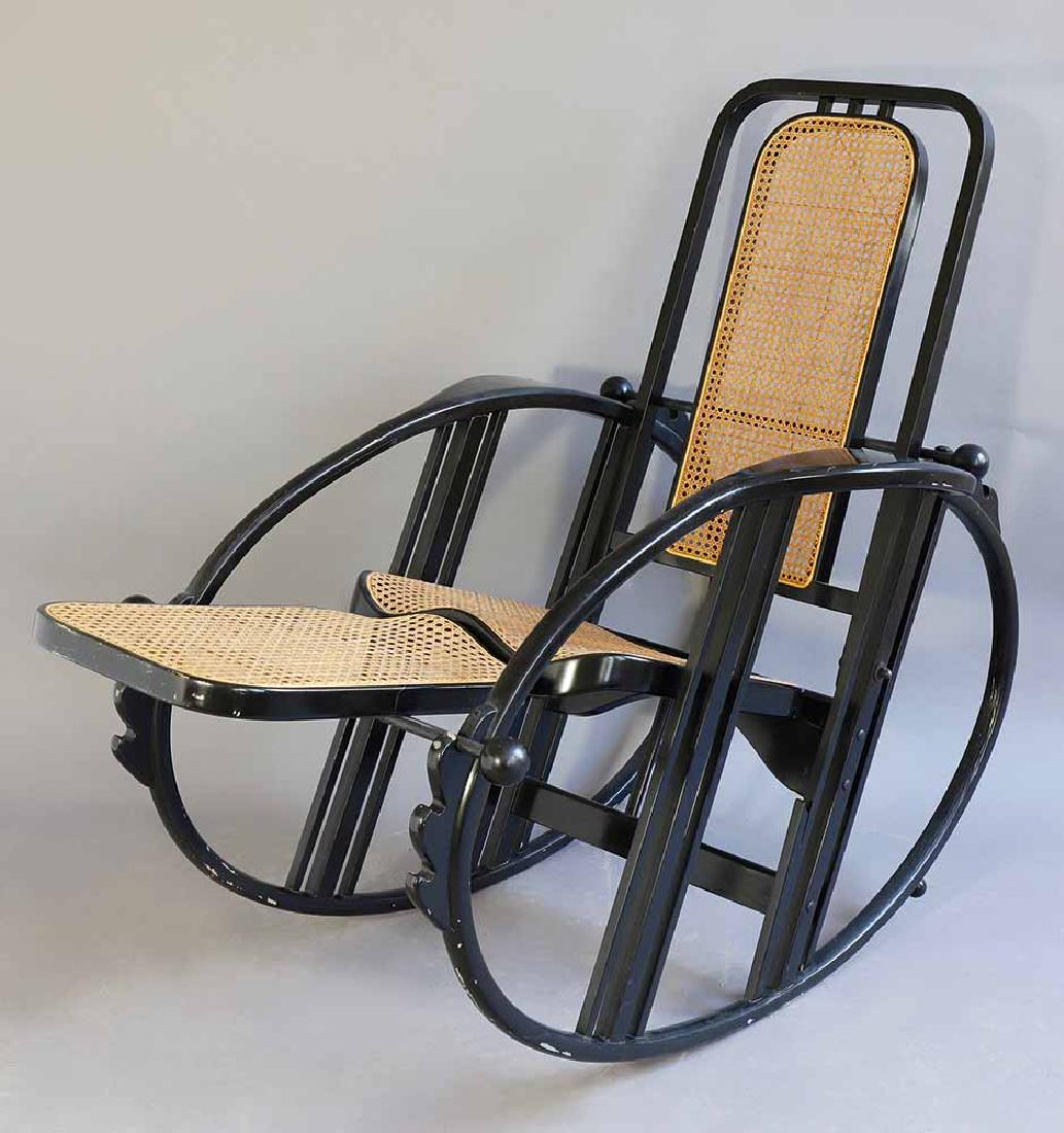 Max Fabiani attr., Antonio Volpe, Rocking Chair 267 Egg: Rocking chair model 267 Egg. Designed around 1914 for Società Antonio Volpe, 1980s edition, Wittmann Austria. Black lacquered bentwood and wood, Viennese weave. 114 x 72 x max. 158 cm. Multiple a