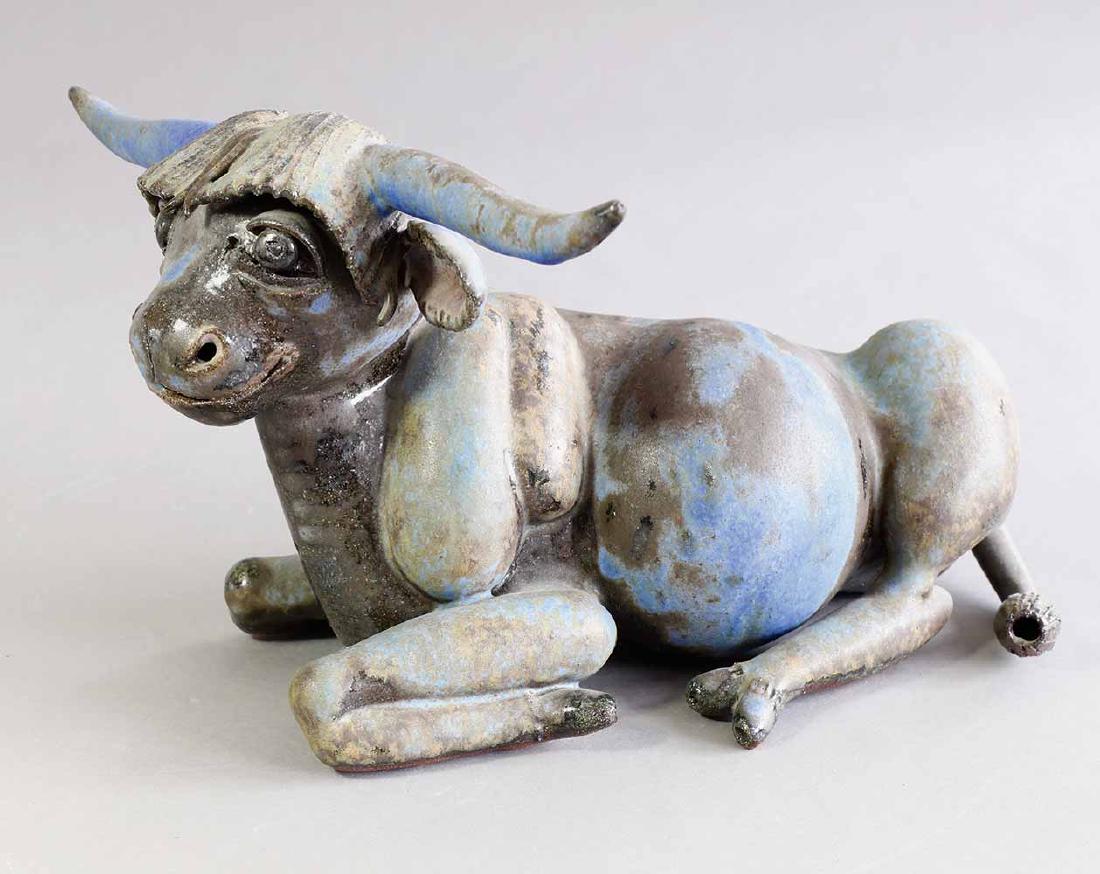 Beate Kuhn, Bull: Bull. Ceramics. Multi-tone blue, green and brown glaze. H. 15 cm, W. 22 cm, D. 27 cm. At the bottom inscribed with workshop mark (spiral). Provenance: Private collection. Acquired from Beate Kuhn.