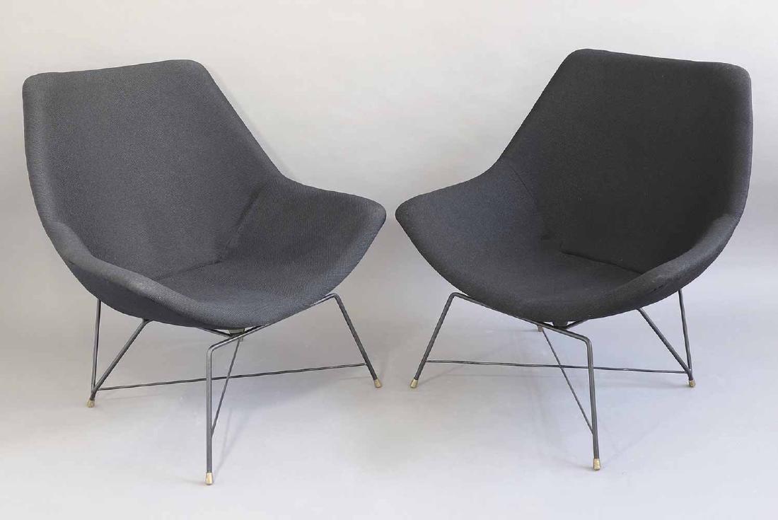 Augusto Bozzi, Fratelli Saporiti, 2 Easy Chairs: 2 armchairs. Designed 1954. Black painted steel wire bases, brass feet, black fabric shells. 87 x 84 x 75 cm. Labeled on the underside.