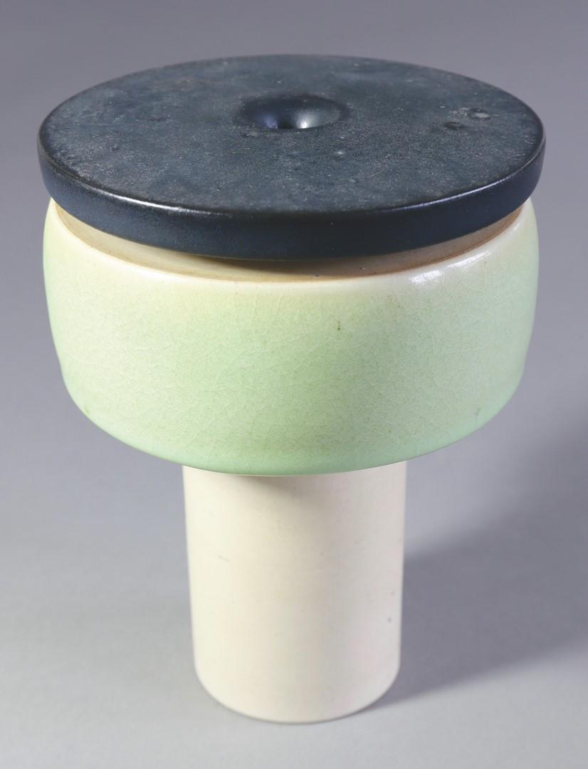 Fritz Vehring, Vessel form, Assemblage: Vessel assembly. 1977. Tall vessel shape. 1974. Stoneware. Various glazes. Cylindrical shape in light green, disc-shaped collar anthracite. H. 17,8 cm. On the bottom marked FV. 77 (scratched)., Litera