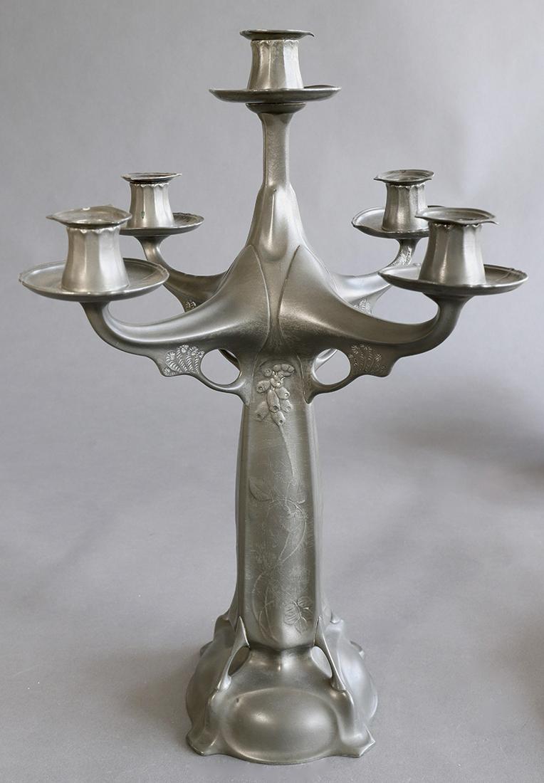 Kayser Krefeld, Large Candelabra Mod. 4486: Hugo Leven, J.P. Kayser, Krefeld, Large candlestick, 5 lights. Tin. Draft 1900/1901. Relief decor with bluebells and fern-like panicles. H. 48.5 cm, D. 36 cm. Inscribed on the bottom: KAYSERZINN 4486.