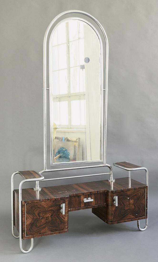 Trubular Steel Dresser 1930s: Tubular steel dressing table. Designed in the 1930s. Chromed tubular steel, swiveling mirror, wood painted in wood look. 181 x 109 x 34 cm.