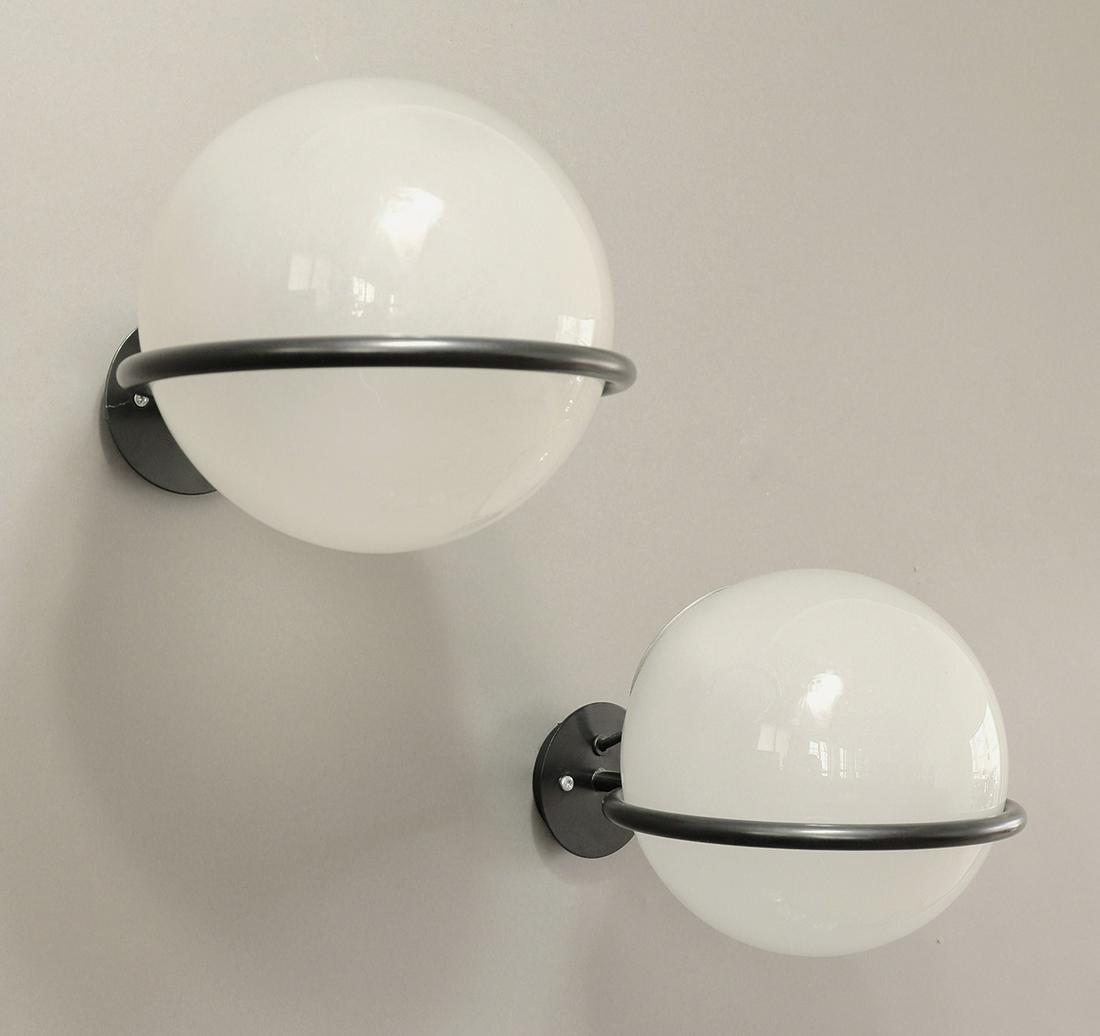 Gino Sarfatti Arteluce 2 Wall Lamps Mod. 238/1: Gino Sarfatti, Arteluce, Brescia, 2 wall lights model 238/1. Designed in 1960. Black painted metal, frosted glass. 20 x 20 x 29 cm. Each labeled with a sticker., Literature: Marco Romanelli & Sandra S
