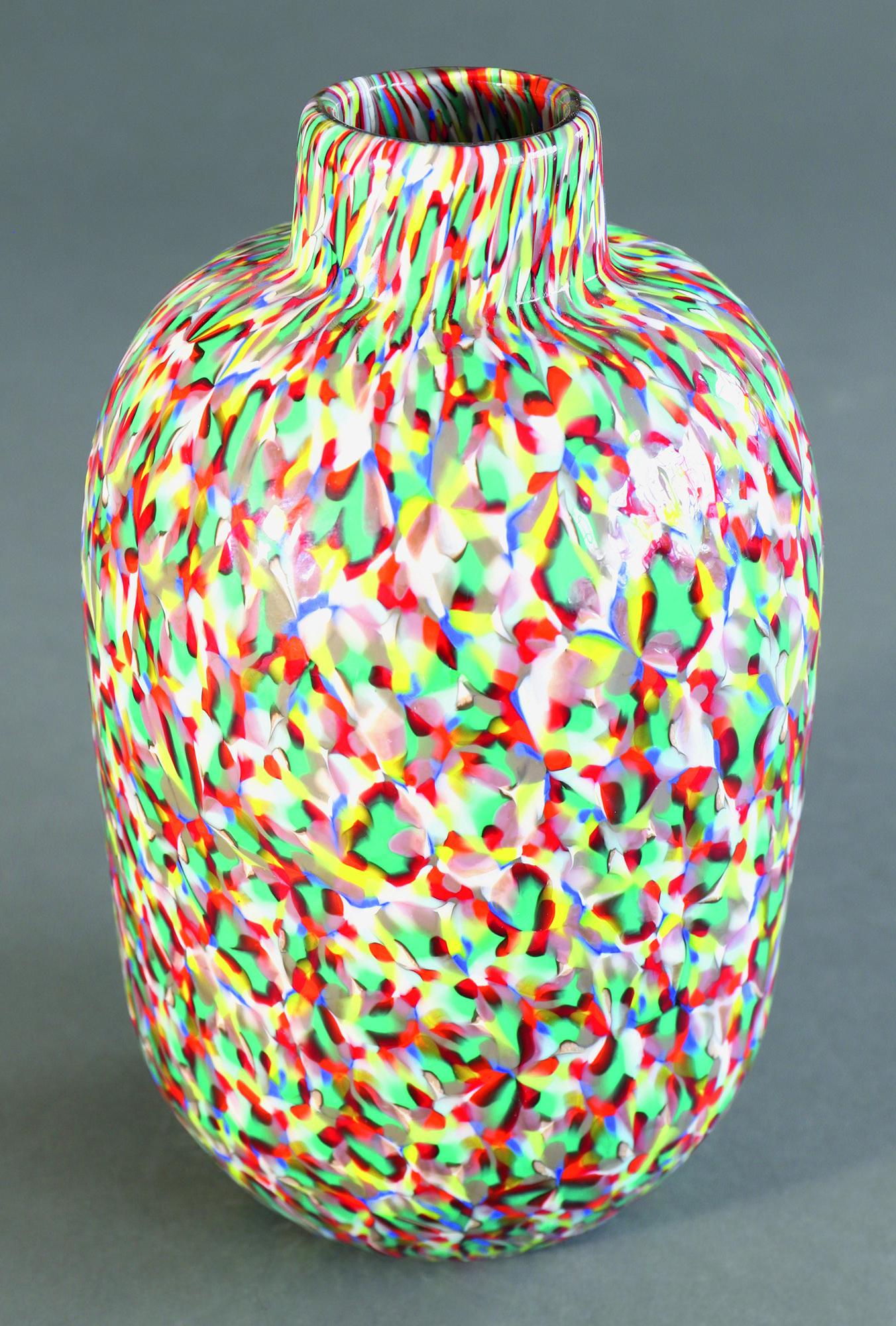 Vittorio Ferro ,Vase: Vittorio Ferro, Vase. Polychrome glass, colorless overlaid inside. Decor made of green, yellow, red, light blue, light gray and white patterned murrines. H. 22.5 cm.