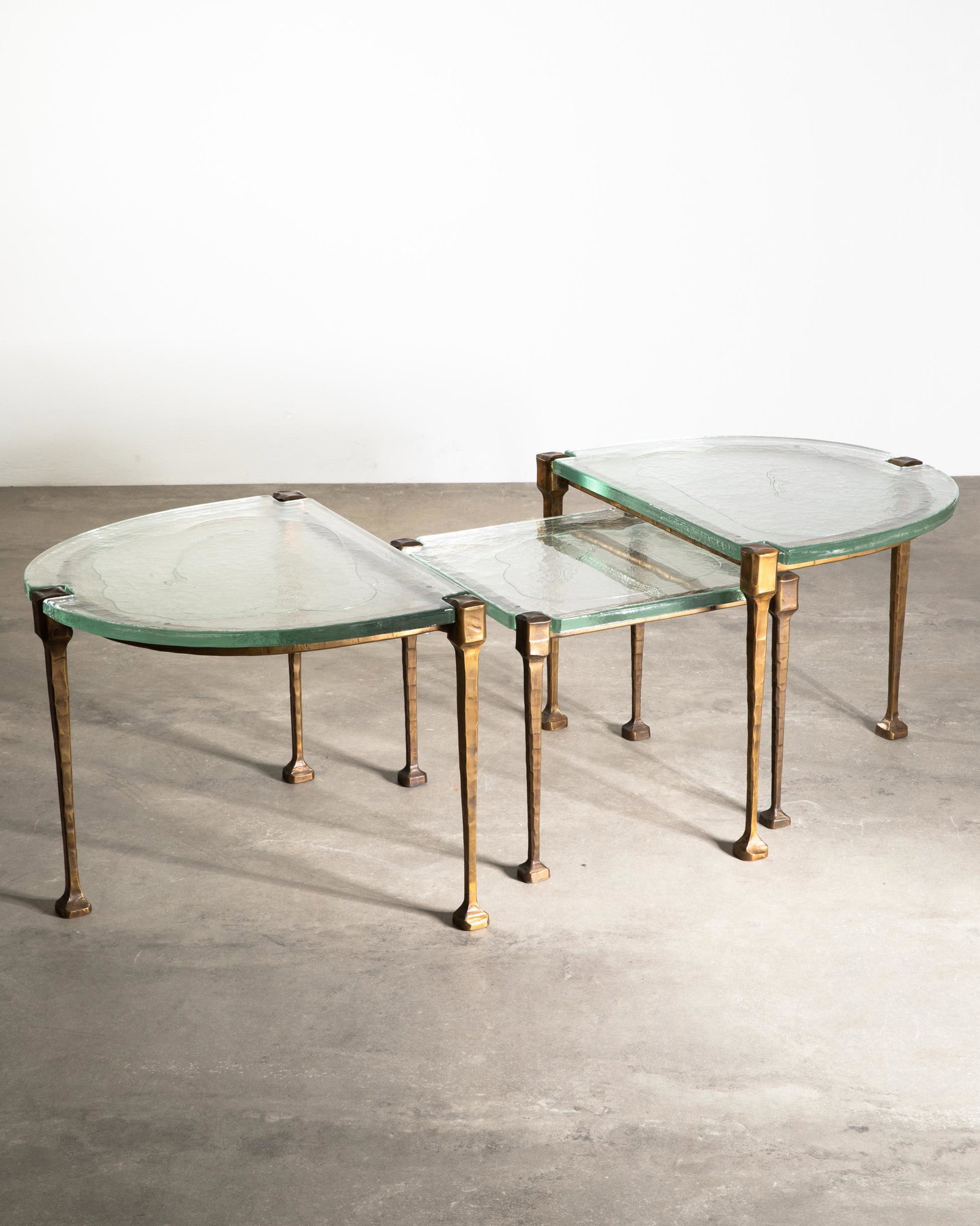 Lothar Klute, 3 Organic Bronze Coffe Tables: Lothar Klute, 3 organic shaped side tables / nesting tables. Designed in 1970 / 80s. Bronze, cast glass. 51/43 x 70/49 x 56/49 cm.