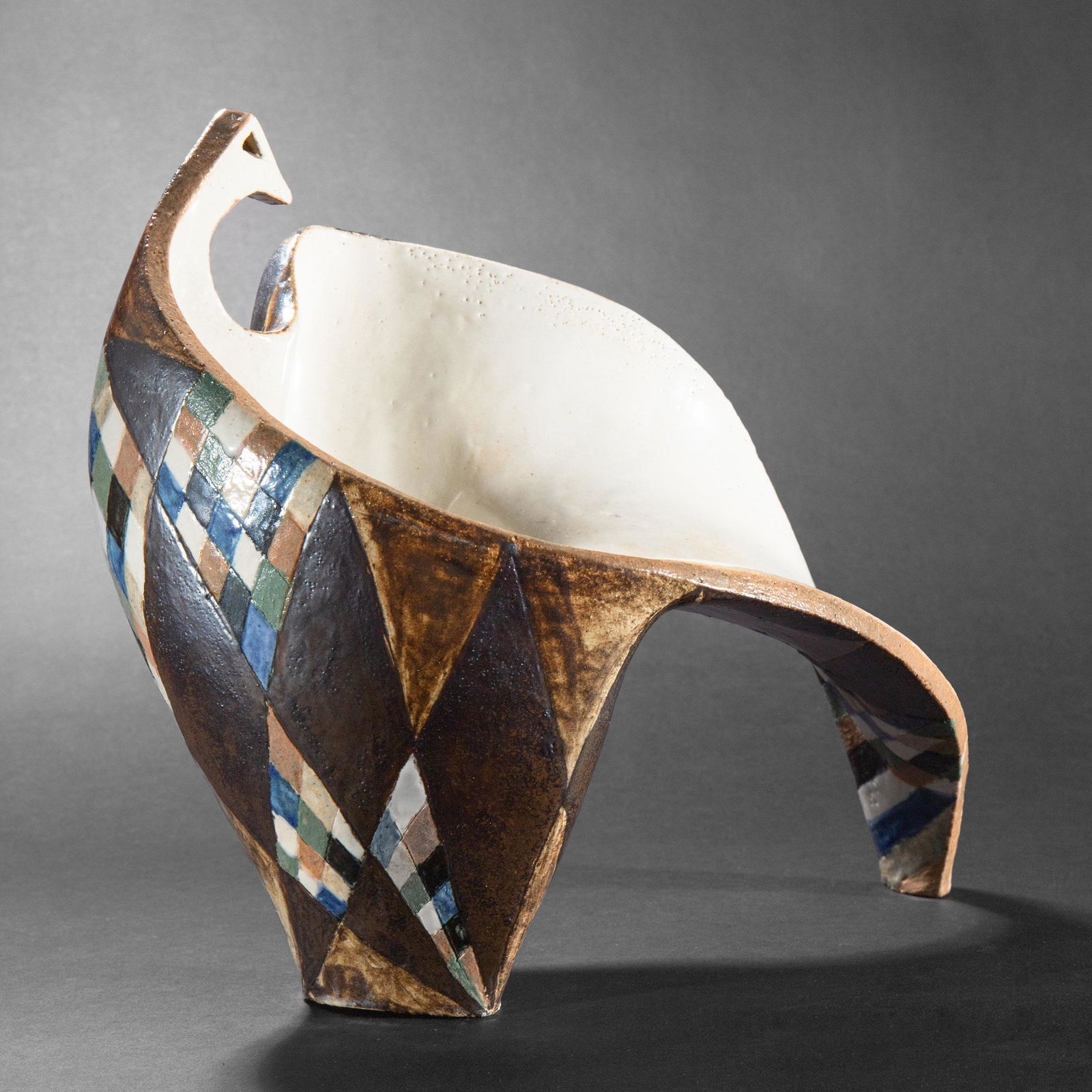 Albert Diato, Sculptural Vessel: Alberto Diato Sculptural Vessel. 1956. Stoneware. Vessel in the form of an abstract bird. Polychrome decoration with rhombuses on the outer wall. 26.6 x 30 x 18cm. Marked and dated on the bottom: AD 5