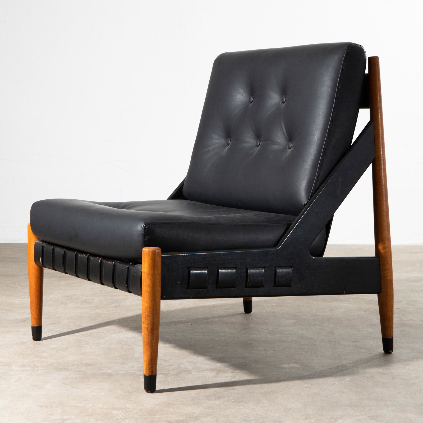 Egon Eiermann, Wilde & Spieth, Lounge Chair Model SE 12: Egon Eiermann Wilde & Spieth, Esslingen Lounge chair, model SE 12. Designed in 1969. Wood, partially varnished, leather straps, imitation leather. 84 x 72 x 76 cm. Literature: Badisches Landesmuseum K