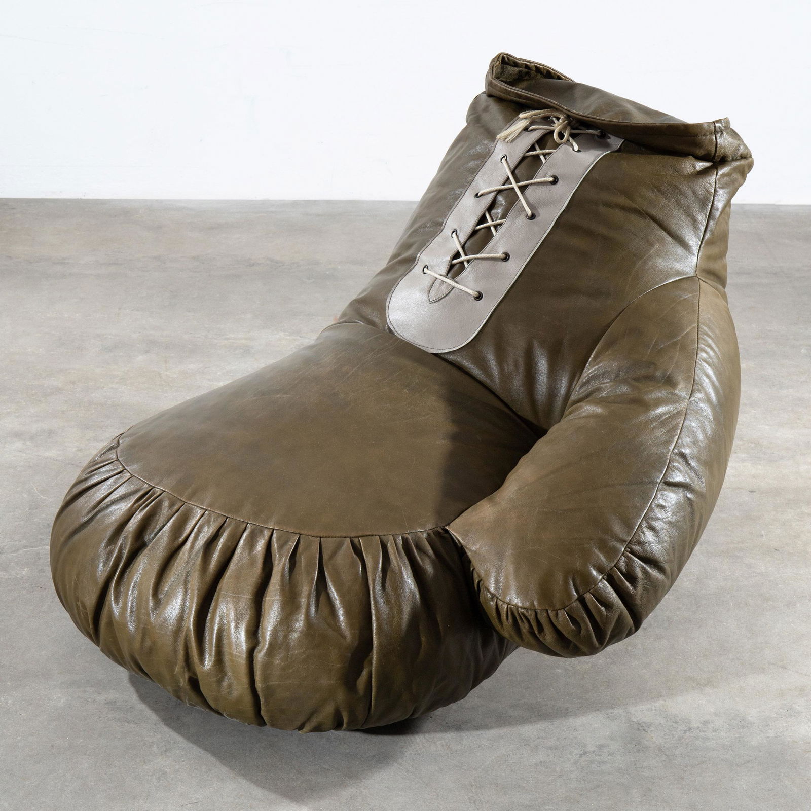 Susi & Ueli Berger, deSede, Sitting object, model mini boxing glove: Susi & Ueli Berger de Sede Sitting object, model mini boxing glove. Designed around 1970. Leather with cord. 77 x 90 x 115 cm.