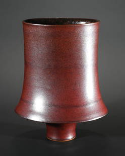 Karl Scheid, large oxblood Vase: Karl Scheid Large oxblood vase. 1999. Stoneware. Semi-gloss black speckled oxblood glaze. Oval basic shape with retracted foot. 25.5 x 20 x 12.5 cm. Marked on the bottom with workshop mark and date