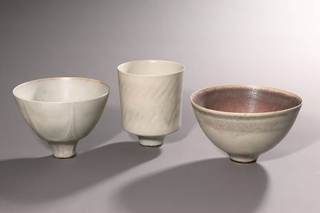 Karl Scheid, Three vases/ bowls, 1975-1983: Karl Scheid Karl Scheid, Three vases/ bowls, 1975-1983. Porcelain, creamy white and pink matt glazed. H. 7.2 cm, H 8 cm, H. 9.6 cm. Each inscribed: artist's signet, dates 75, 77, 83 (embossed).