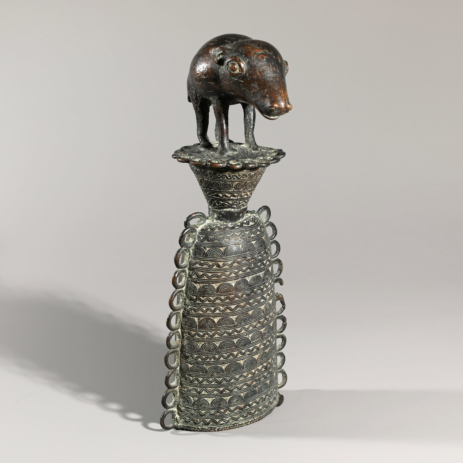 Westafrika, bell with pig (1 of 5)