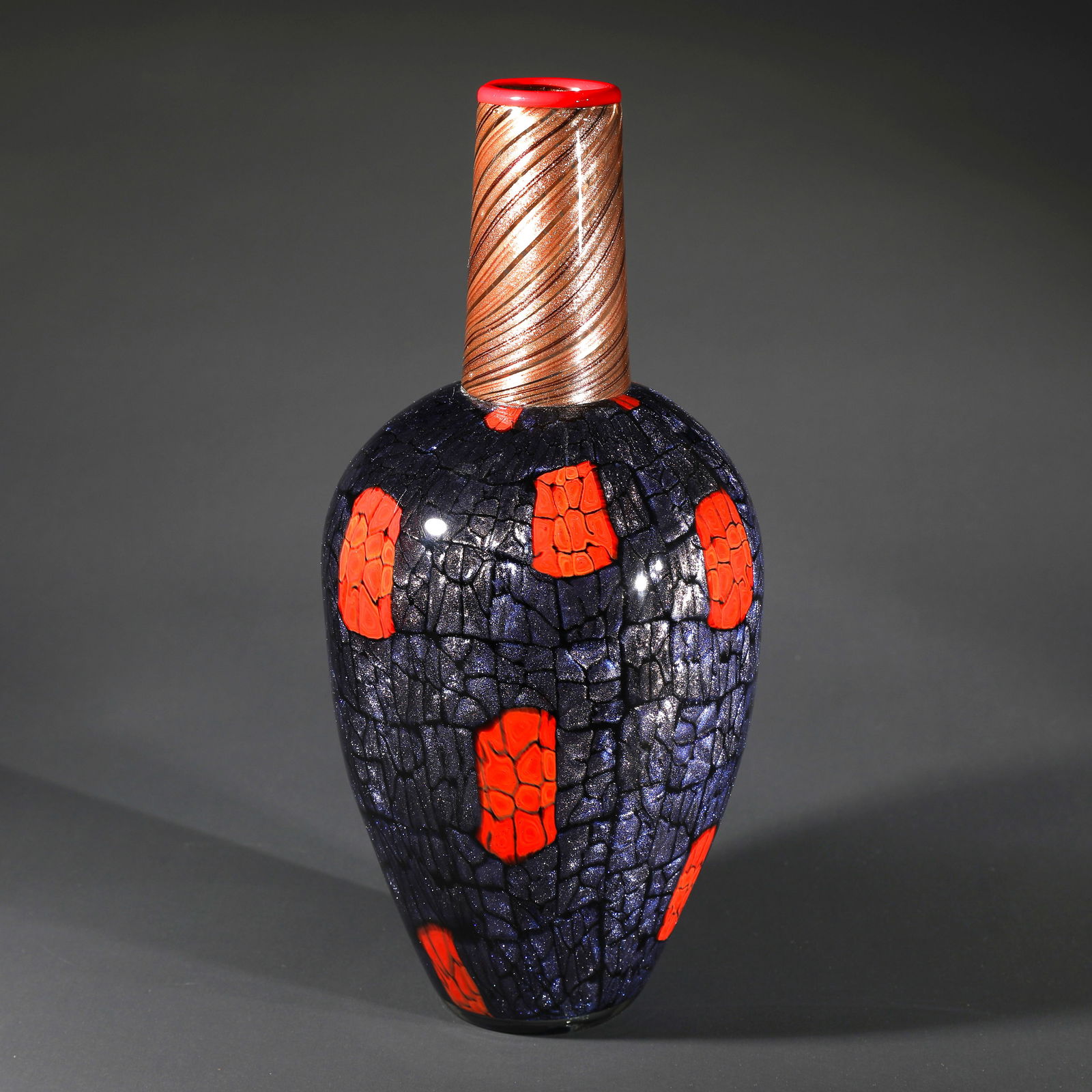 Vittorio Ferro, Vase Murrine, 2001: Vittorio Ferro Cased glass, colorless, metallic blue and red murrine arranged like windows, neck with bands in aventurine, mouth melted red. H. 36.5 cm. Signed: VITTORIO FERRO 2001 (engraved).