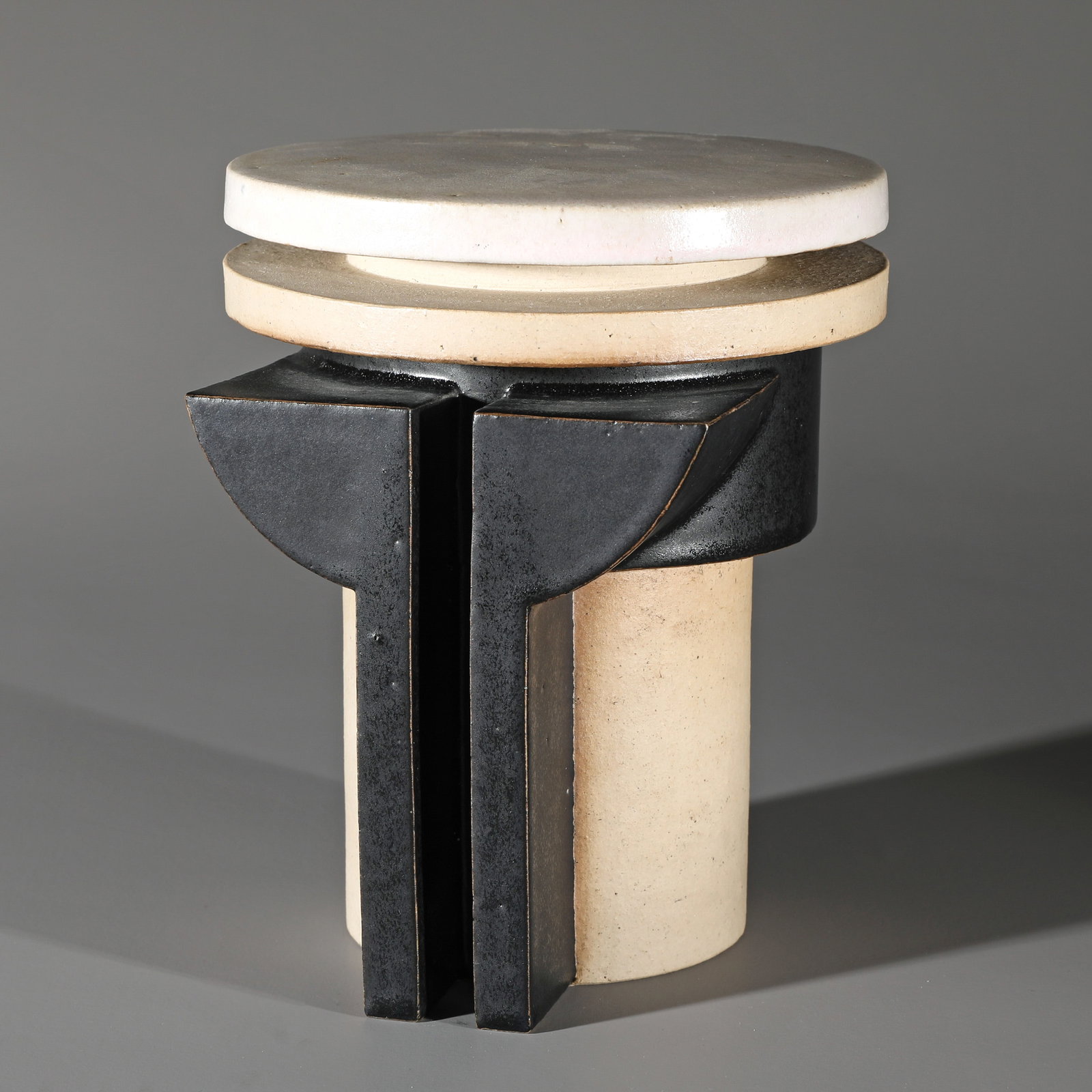 Fritz Vehring, Plastic: Ceramic, white, beige and black glazed. Stacked, geometric shapes. 19 x 17 x 15.5 cm. Marked on the underside: FV. 77 (incised).