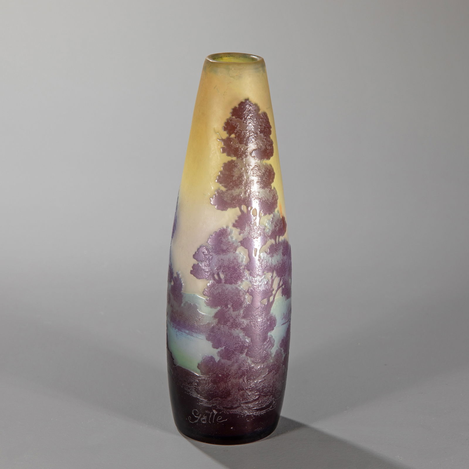 Etablissements Galle, Nancy, Vase 'Paysage des Vosges', c. 1914: Galle Cased glass, colorless, yellow, blue, and violet. Etched decoration of a Vosges landscape with a lake. H. 17.3 cm. Marked: Gallé (etched).