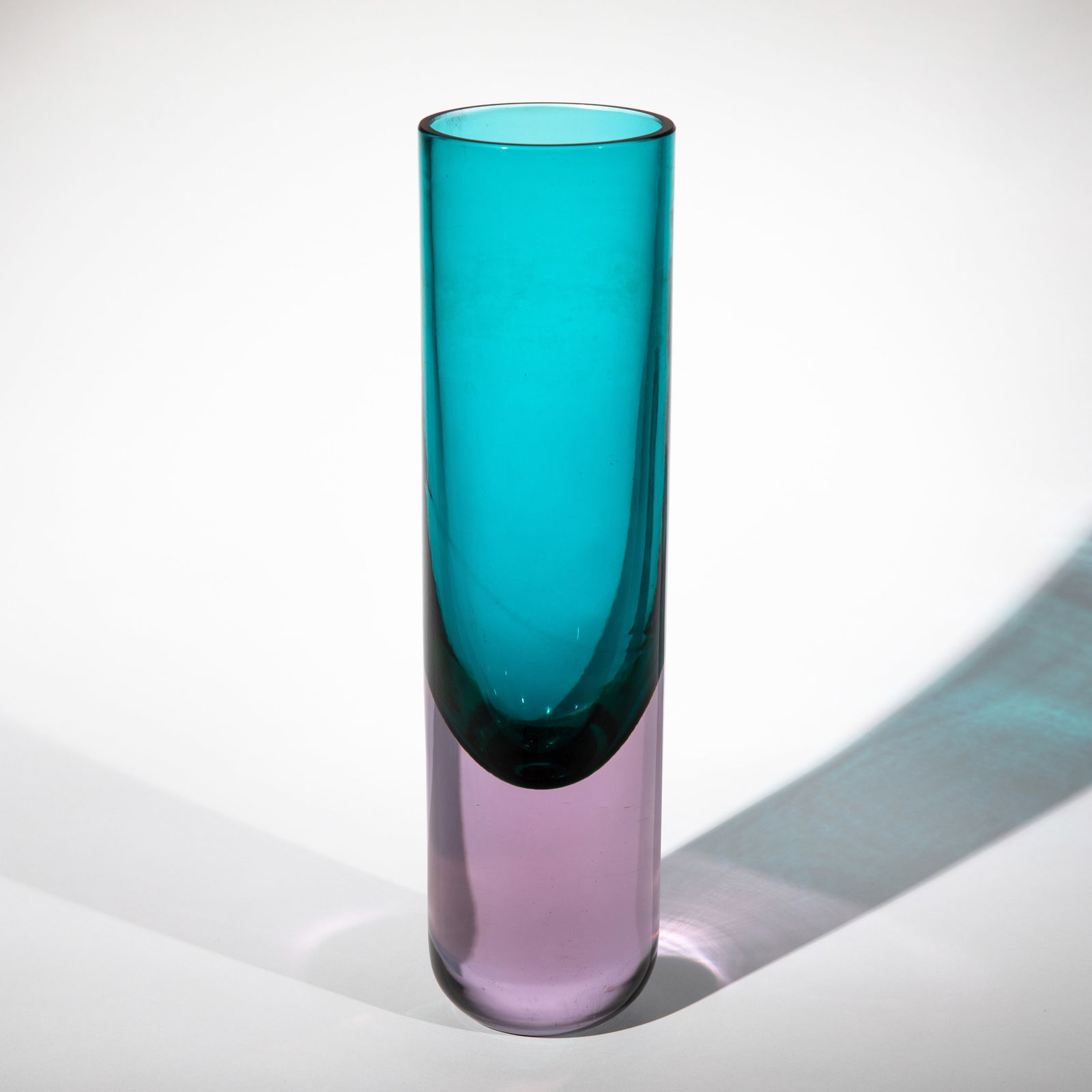 Antonio Da Ros, Vase 'Sommerso': Designed c. 1960. Cylindrical. H. 33.3 cm. Execution: Gino Cenedese & C. Thick-walled cased glass, colorless, pink, and blue.