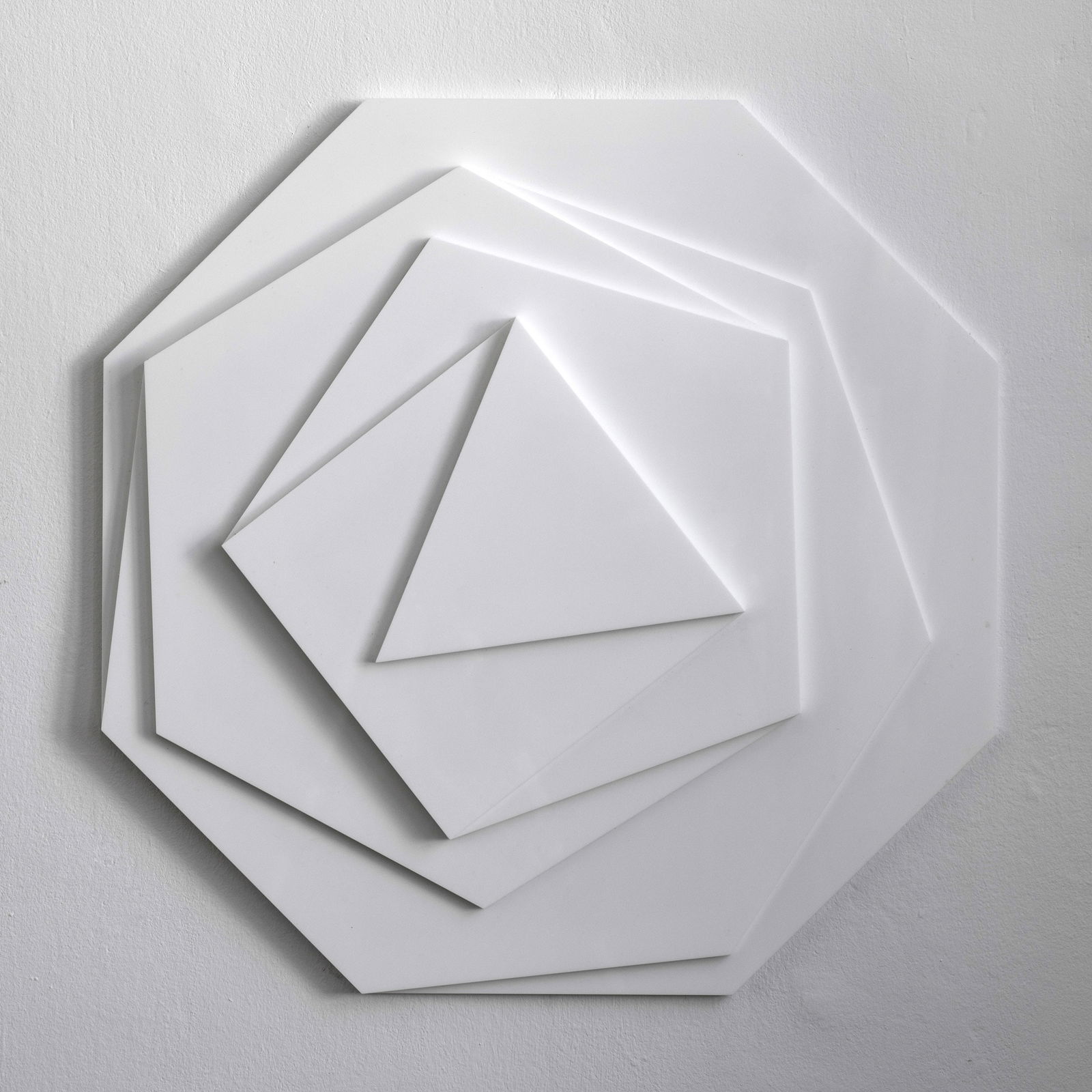 Max Bill (1908-1994 ), 'Triangle to Octagon', 1935/1975: Relief composed of six mounted white acrylic glass elements. D. 77 cm, H. 6 cm. Labeled on the reverse: Max Bill Relief/ 3-eck bis 8-eck/ 1935/ This is number 3 from an edition of 22. Also signed on t