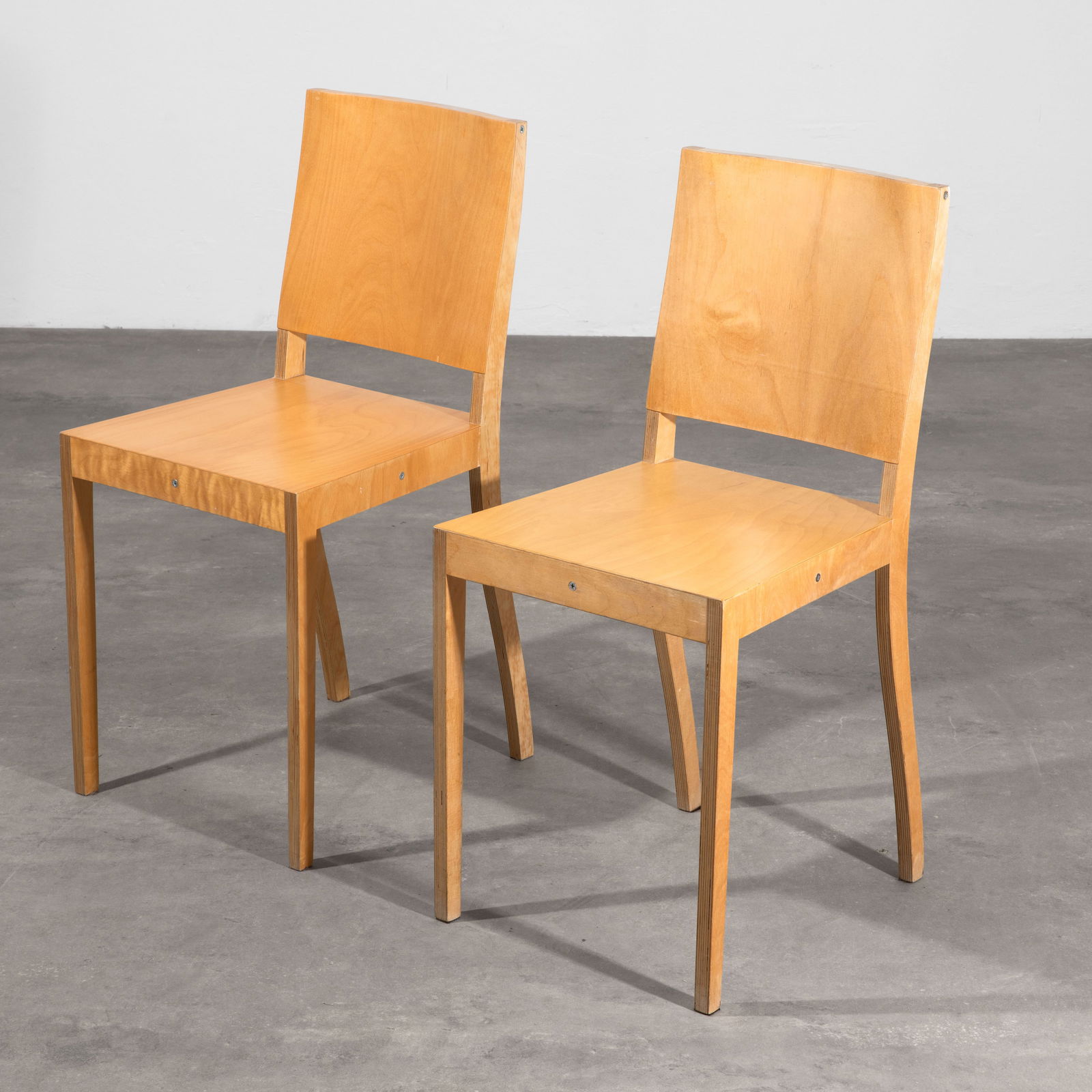Jasper Morrison, 2 chairs model Ply-Chair: Designed in 1988/89. Produced by Vitra in 1999/2001. Plywood. 84 x 39 x 47 cm. Both chairs bear Vitra and GS stickers.