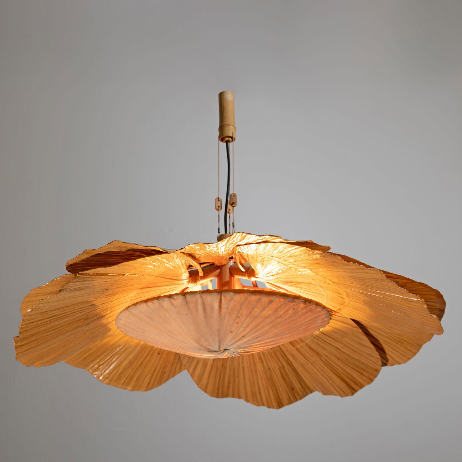 Ingo Maurer, Pendant lamp model Hanna II from the Uchiwa series: Ingo Maurer Designed in 1974. Manufactured by Design M. Six compartments made of bamboo and rice paper, bamboo, and cord. Dimensions of the lamp body: approx. H. 25 cm, D. 80 cm. Dimensions of the sus