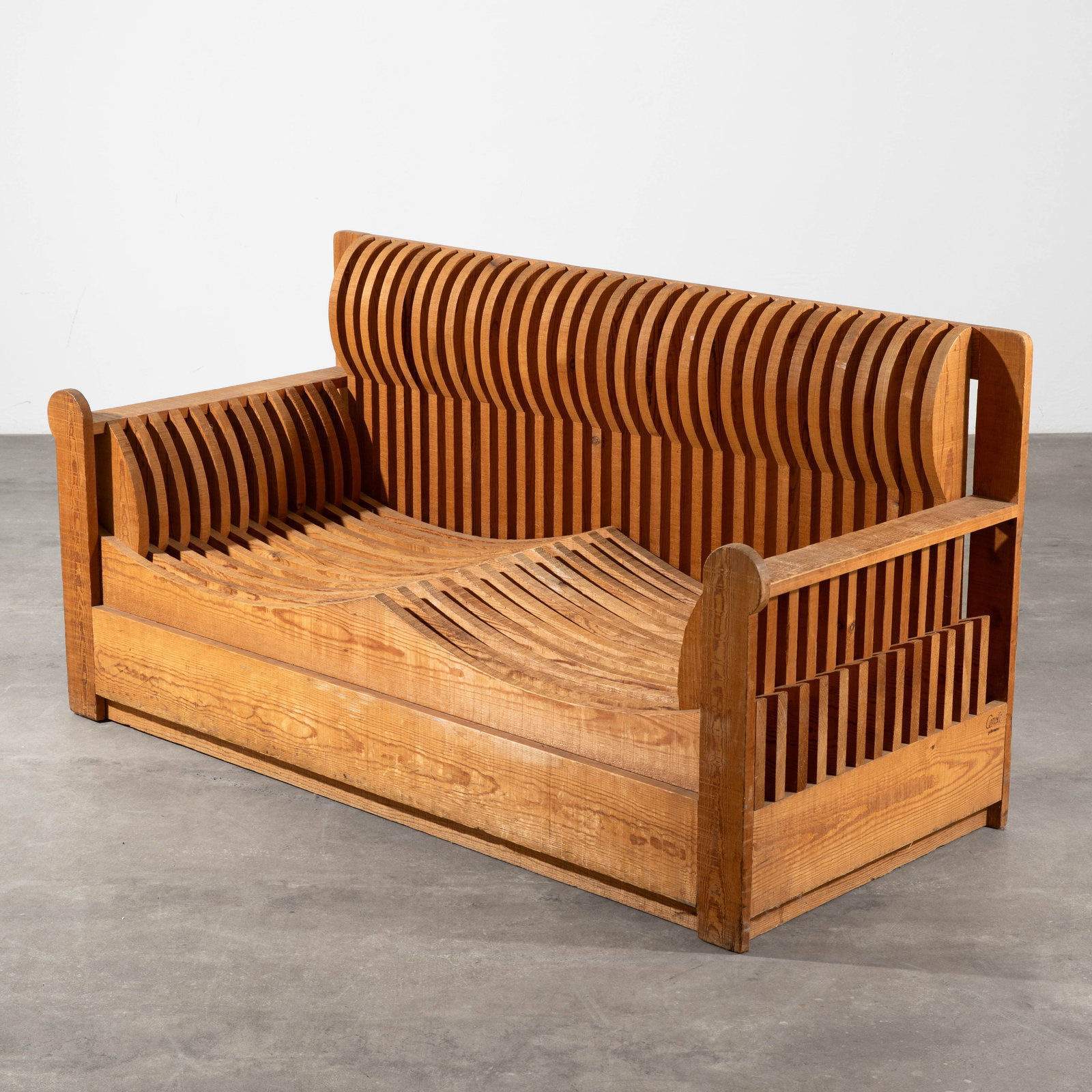 Mario Ceroli, Sofa Model Acqua e terra from the Mobili nella Valle series: Ceroli Designed around 1973. Manufactured by Poltronova. Russian pine. 81 x 158 x 68.5 cm. Branded on the side.