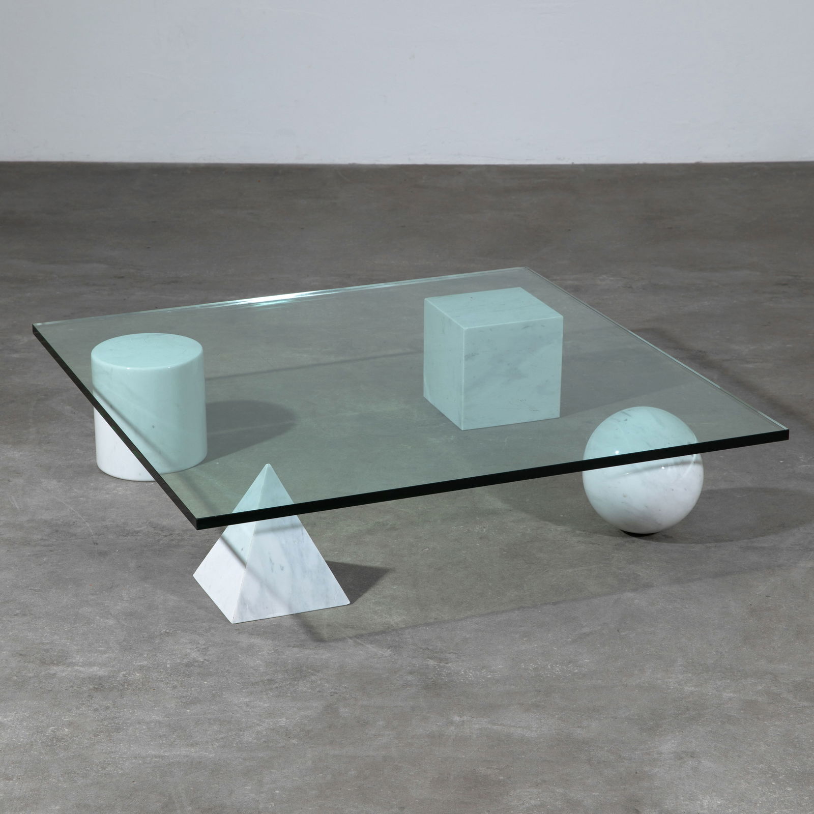 Lella Vignelli & Massimo Vignelli, Coffee Table Model Metafora: Lella & Massimo Vignelli Designed in 1979. Manufactured by Casigliani. Geometric shapes in white marble, glass top. 22 x 100 x 100 cm.