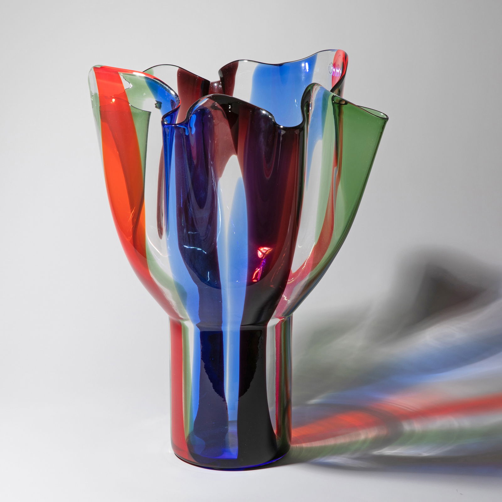 Timo Sarpaneva, Large Vase 'Kukinto': Timo Sarpaneva Designed in 1990. Manufactured by Venini, Murano, 1992. Colorless glass with banded fusions in violet, blue, red, and green. H. 48.5 cm. Inscribed on the base: Venini 92 Sarpaneva (engr