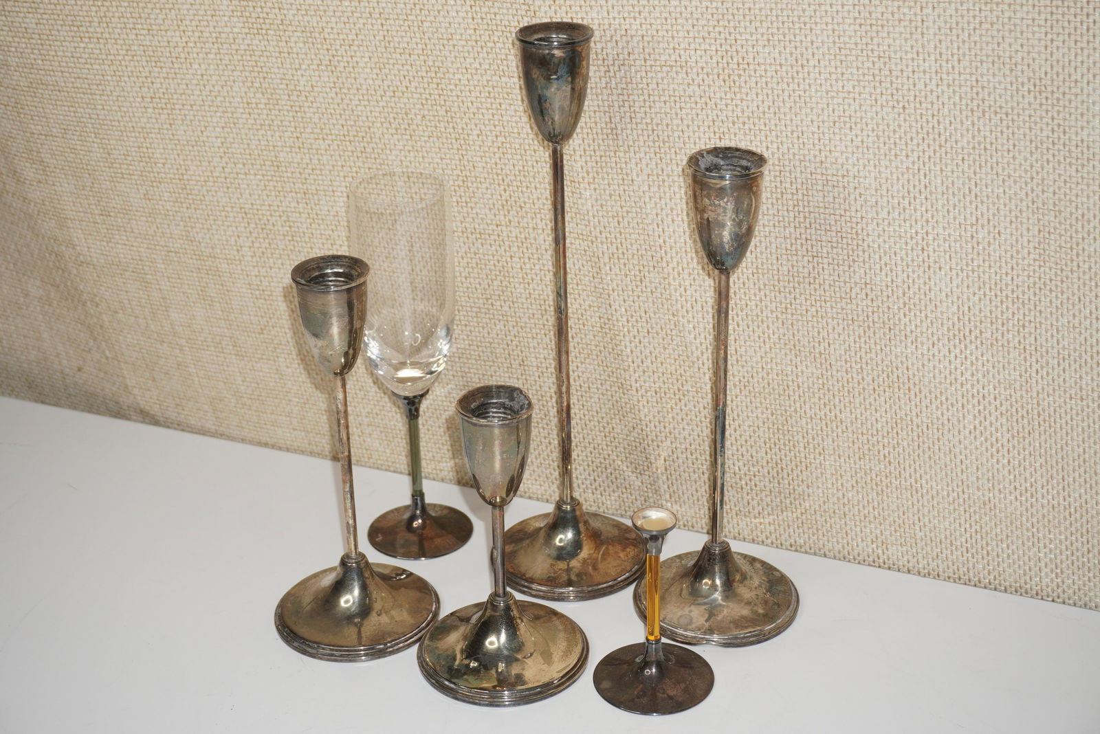 A GROUP OF STERLING SILVER CANDLESTICKS (1 of 3)