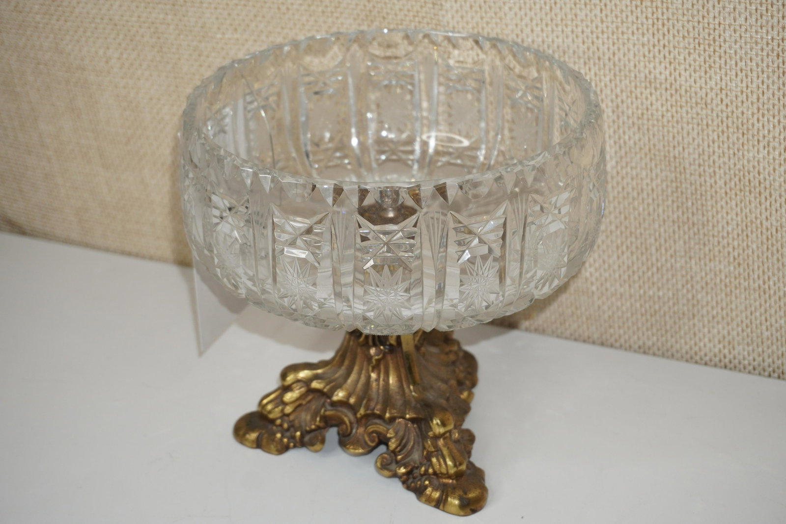 CUT CRYSTAL BOWL ON BRONZE STAND: CUT CRYSTAL BOWL ON BRONZE STAND, 8"H X 8"W, VERY GOOD CONDITION
