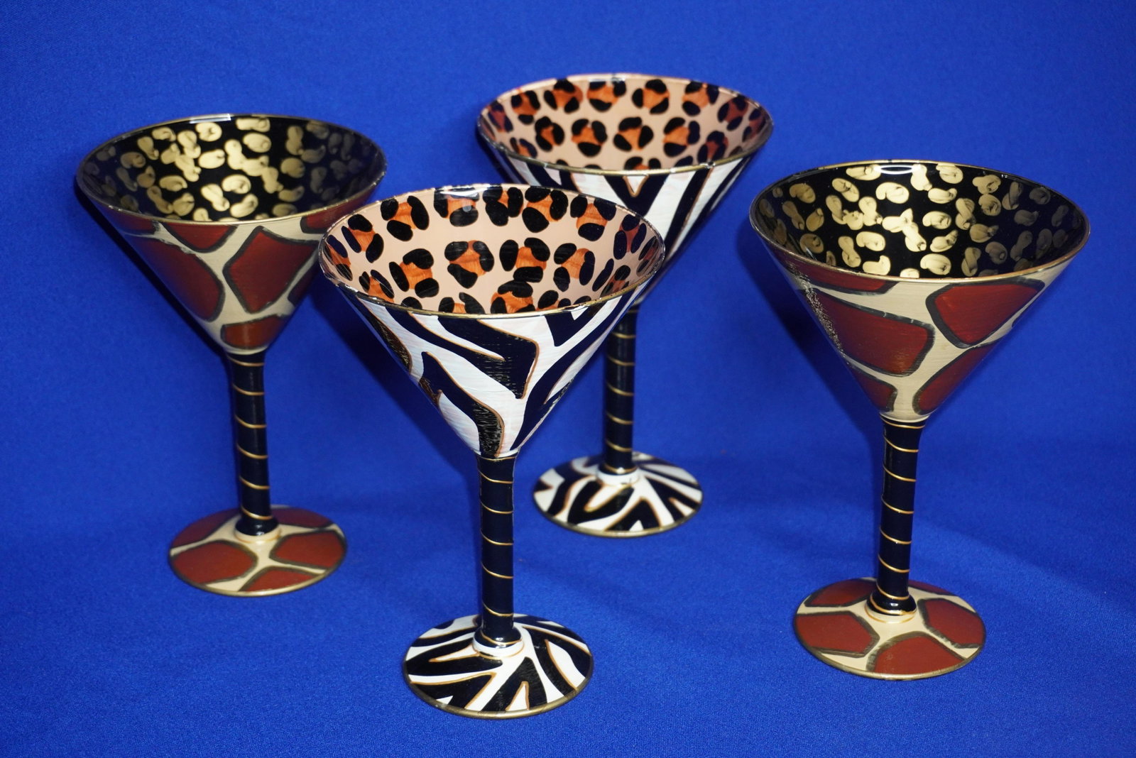 SET OF 4 HAND PAINTED MARTINI GLASSES: SET OF 4 HAND PAINTED ANIMAL PRINT MARTINI GLASSES, 7"H, VERY GOOD CONDITION