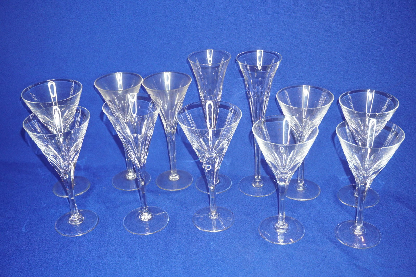 GROUP OF 12 STUART CRYSTAL GLASSES: GROUP OF 12 STUART CRYSTAL GLASSES INCLUDING WINE, WATER & CHAMPAGNE, TALLEST 10.5"H, VERY GOOD CONDITION