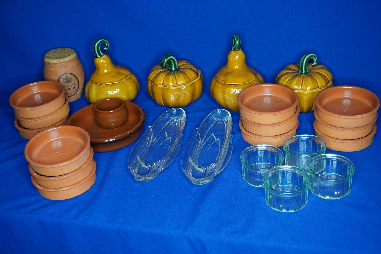 GROUP OF 24 STONEWARE CROCKS & SERVERS: CLAY BOTTLE COASTERS, WILLIAMS-SONOMA LIDDED CROCKS, OLIVE DISH, GLASS REMEKENS & CORN ON THE COB DISHES