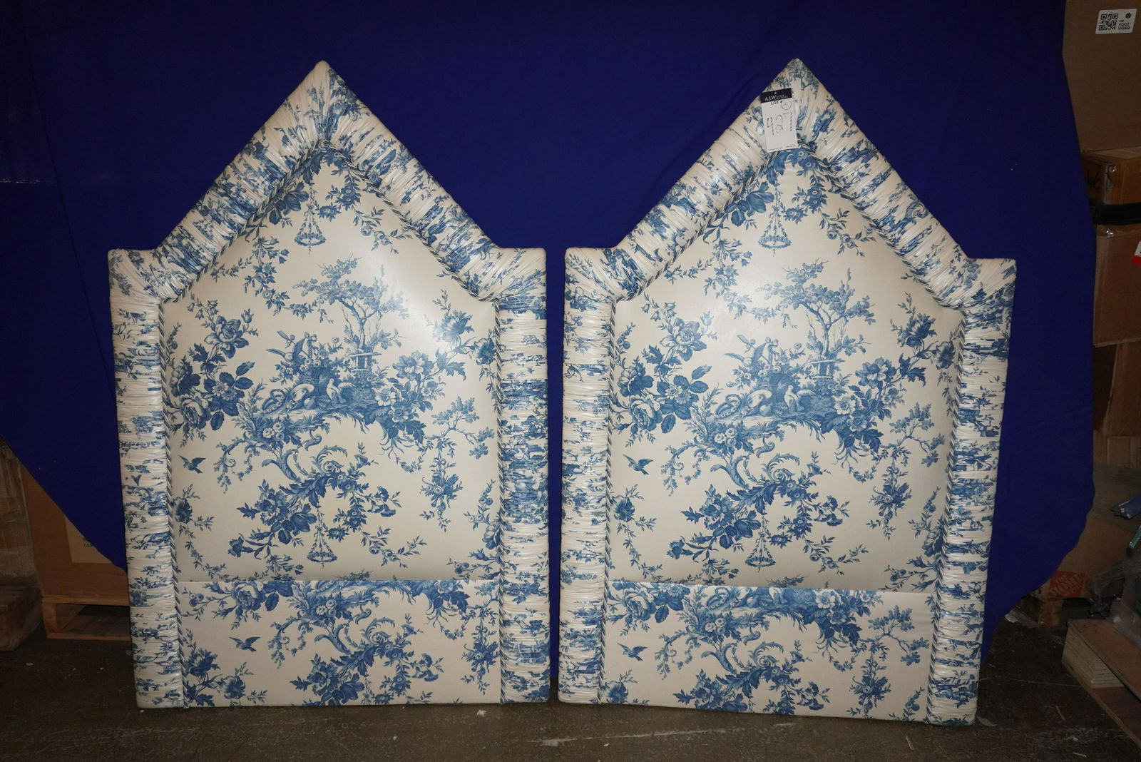PAIR OF TWIN UPHOLSTERED HEADBOARDS: PAIR OF BLUE & WHITE FLORAL TWIN UPHOLSTERED HEADBOARDS, 58"H X 38"W, GOOD CONDITION