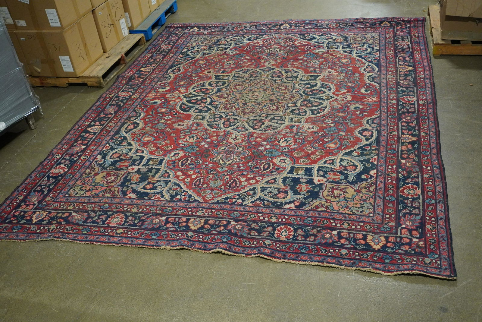 ANTIQUE FINE PERSIAN WOOL RUG: ANTIQUE FINE PERSIAN WOOL RUG RED BACKROUND W/ BLUE ACCENTS, 140"L X 108"W, GOOD CONDITION, NORMAL WEAR
