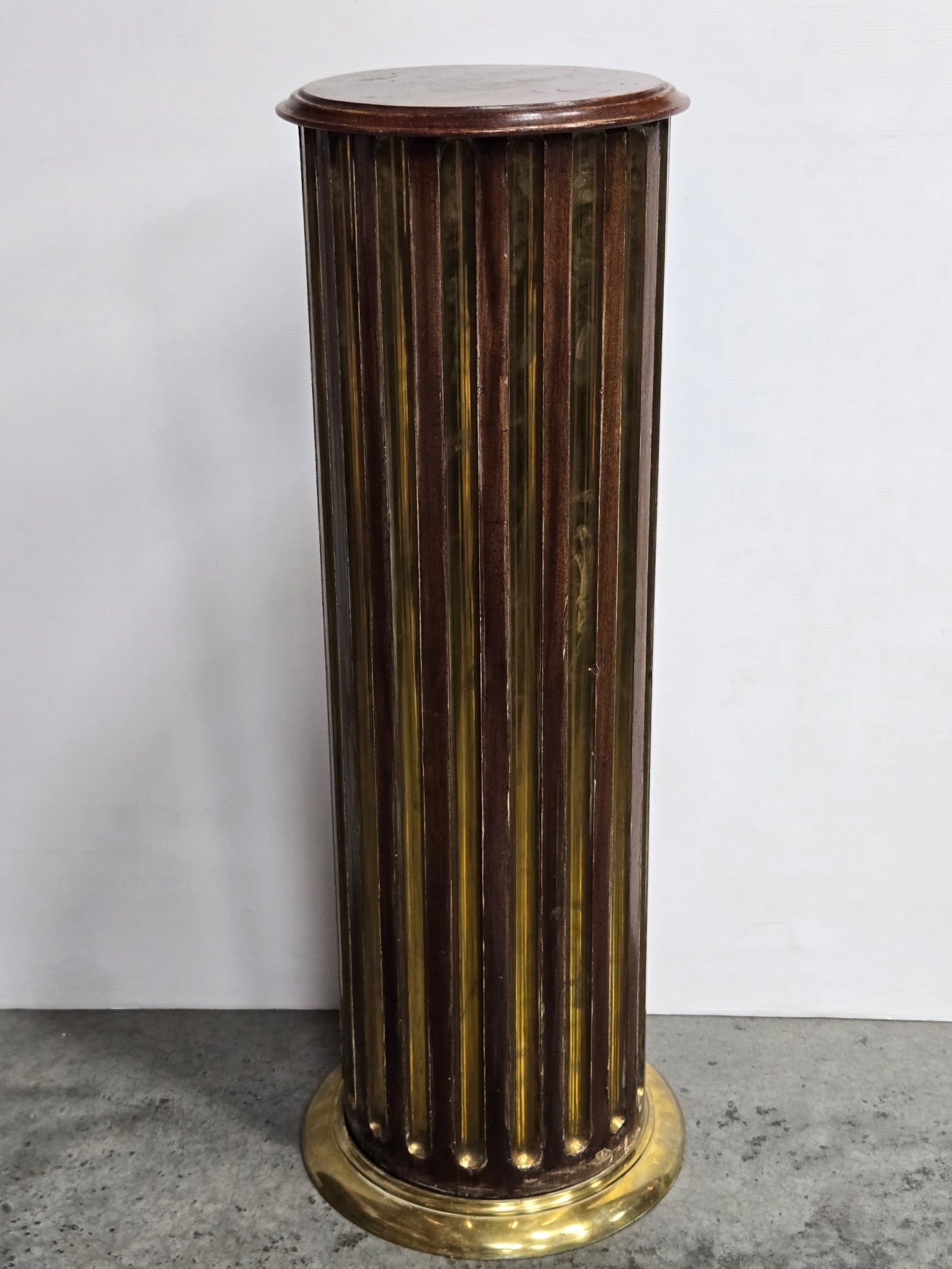 RUSSIAN NEOCLASSICAL BRASS MOUNTED MAHOGANY FLUTED PEDESTAL: Late 18th/Early 19th Century with a later molded circular top. Provenance: Aquired at Southeby's Bill Blass Collection Auction October 2003 (Price Realized: $4,250)