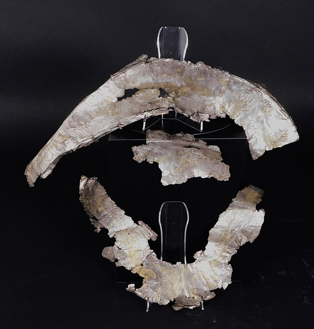 Gilt Silver Saddle Ornament Remnants Liao Dynasty: Gilt Silver Saddle Ornament Remnants presumably Liao Dynasty (907-1125) Phoenix chasing flaming pearl Approx. 22 x 5" largest piece PROVENANCE: Weisbrod Chinese Art, Ltd., New York