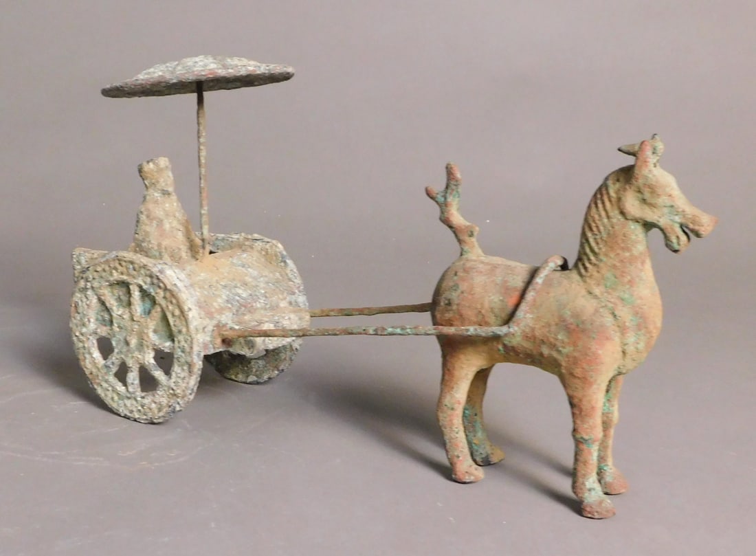 Bronze Horse and Chariot Han Dynasty: Bronze Horse and Chariot presumably Han Dynasty (206BCE-200CE) Approx. 7.5 x 12 x 3.75" PROVENANCE: Weisbrod Chinese Art, Ltd., New York