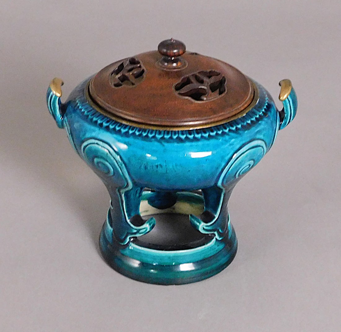 Turquoise Glaze and Gilt Censer with Carved Wood Cover Qing Dynasty: Turquoise Glaze and Gilt Censer with carved wood cover presumably Qing Dynasty (1644-1912) Approx. 6 x 6.5" Diam. PROVENANCE: Weisbrod Chinese Art, Ltd., New York