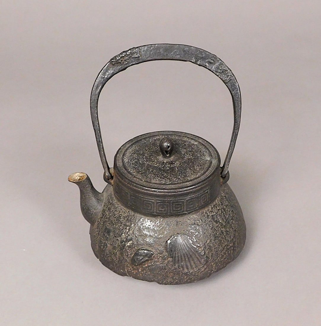 Japanese Cast Iron Tetsubin Teapot Edo Period: Cast Iron Japanese Tetsubin Teapot with hallmark possibly that of Nambu Tekki. Museum inventory mark on the lid and base. Presumably 19th C. Edo period, possibly older. Approx. 9"x 6.75 Diam. PROVENAN