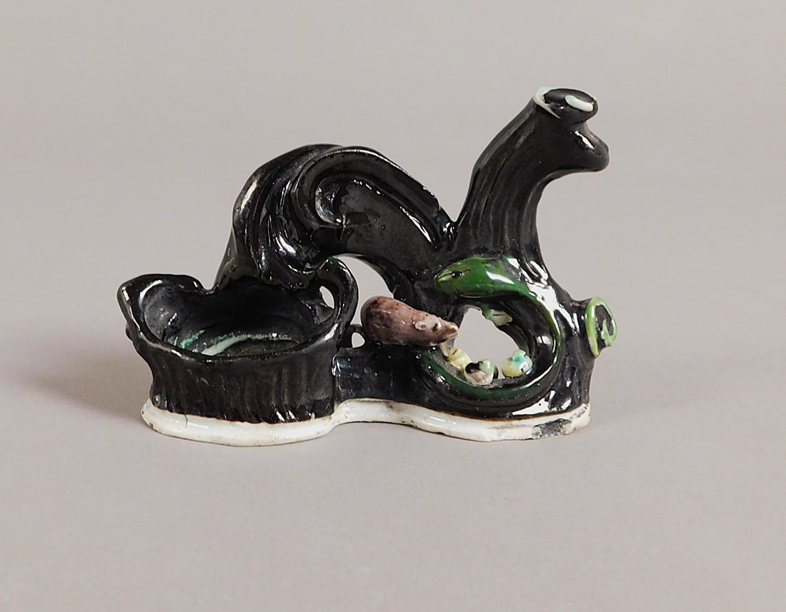 Black and Green Glaze Porcelain Brush Pot Rat Stealing Snake Eggs Qing Dynasty: Black and Green Glaze Porcelain Brush Pot Rat Stealing Snake Eggs presumably Qing Dynasty (1644-1912) Approx. 3 x 4.5 x 1.25" PROVENANCE: Weisbrod Chinese Art, Ltd., New York