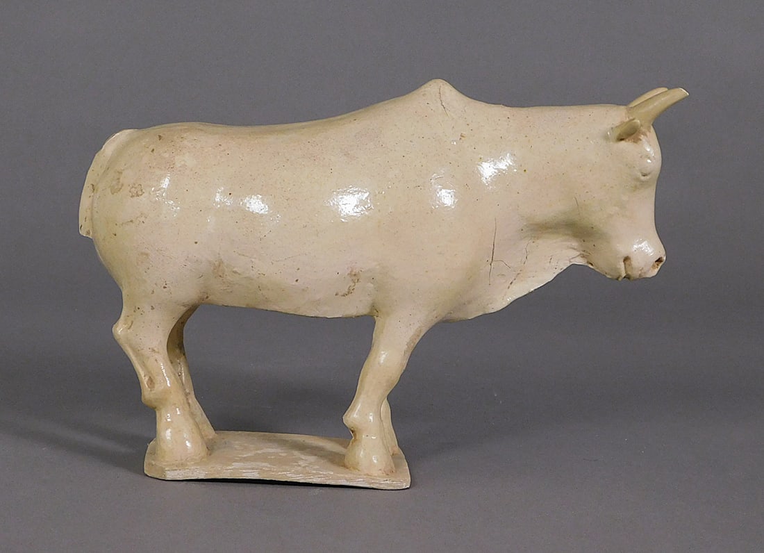 Pottery Bull w/ Pale Yellow Glaze Sui/Tang Dynasty: Pottery Bull w/ Pale Yellow Glaze presumably Sui/Tang Dynasty (581-907) Approx. 7 x 10.5 x 3.5" PROVENANCE: Weisbrod Chinese Art, Ltd., New York