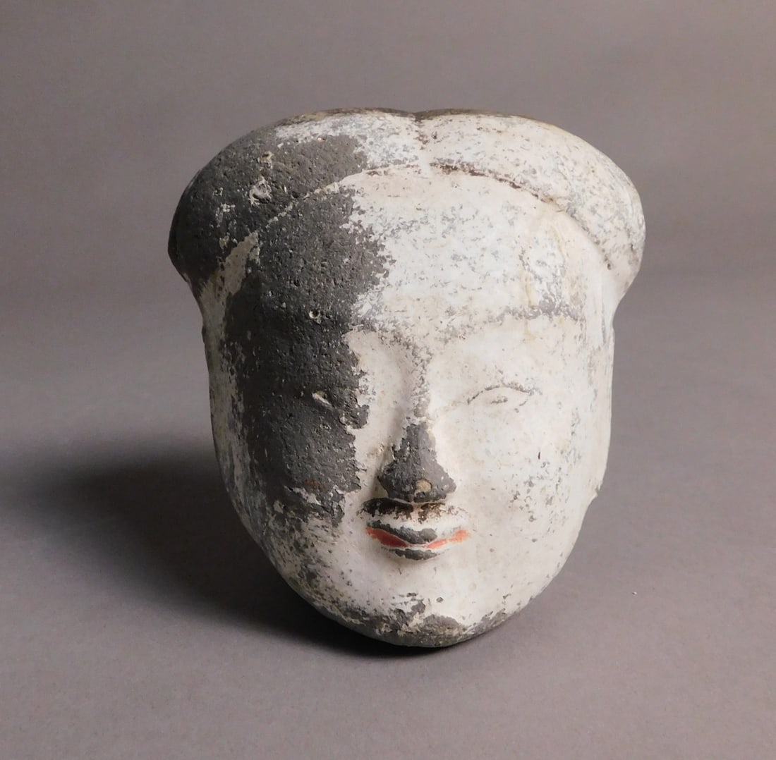 Painted Pottery Female Head Han Dynasty: Painted Pottery Female Head presumably Han Dynasty 206BCE-220CE Approx. 4 x 3.5 x 3.5" PROVENANCE: Weisbrod Chinese Art, Ltd., New York
