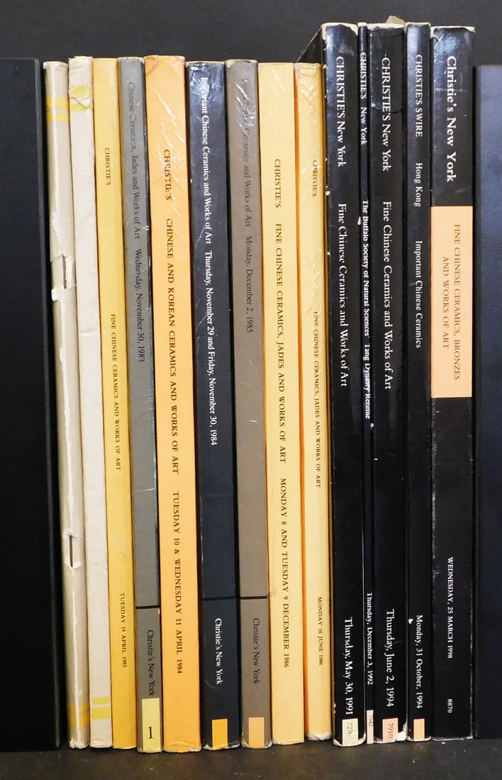 A Collection of Christie's Chinese and Asian Art Catalogs 1979-1994: A collection of approximately (14) Christie's catalogs focused on Chinese and Asian Art 1979-1994, New York, London, Hong Kong, many have notations and some have attached price results PROVENANCE: Wei