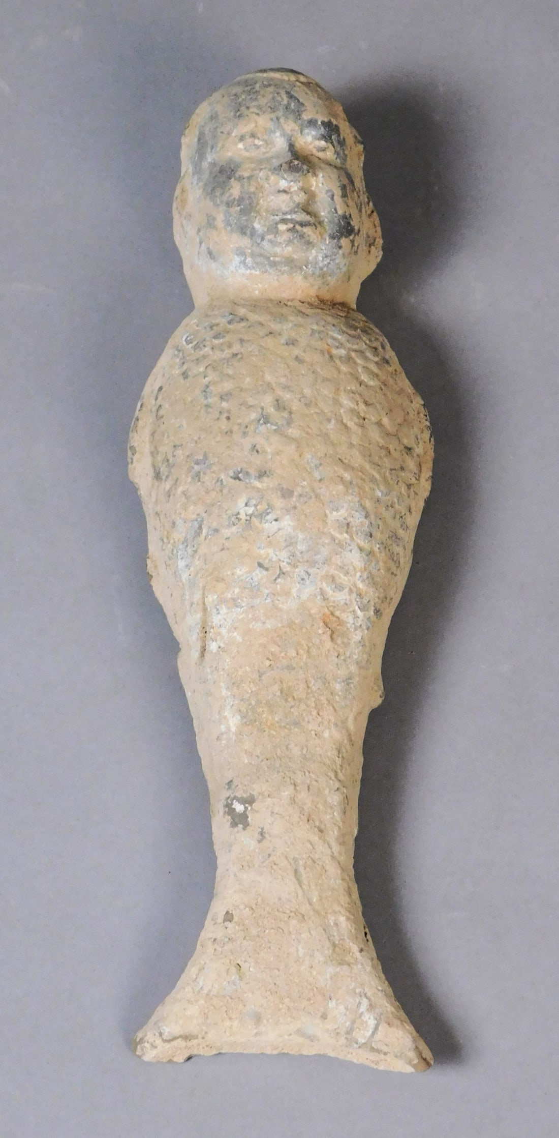 Grayware Therianthropomophic Figure Han Dynasty: Grayware Therianthropomophic Figure, man and fish, presumably Han Dynasty (206BCE-220CE) Approx. 10.5 x 3.25 x 1.5" PROVENANCE: Weisbrod Chinese Art, Ltd., New York